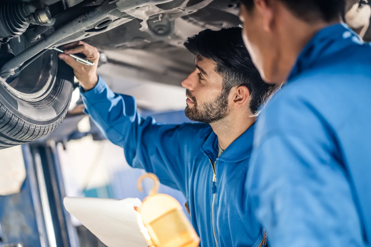 vehicle-service-maintenance-handsome-mens-checking-2023-11-27-05-13-06-utc